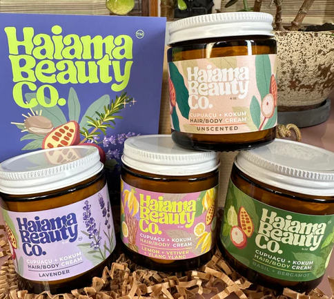 A photo of a variety of hair and skincare products from Haiama Beauty.