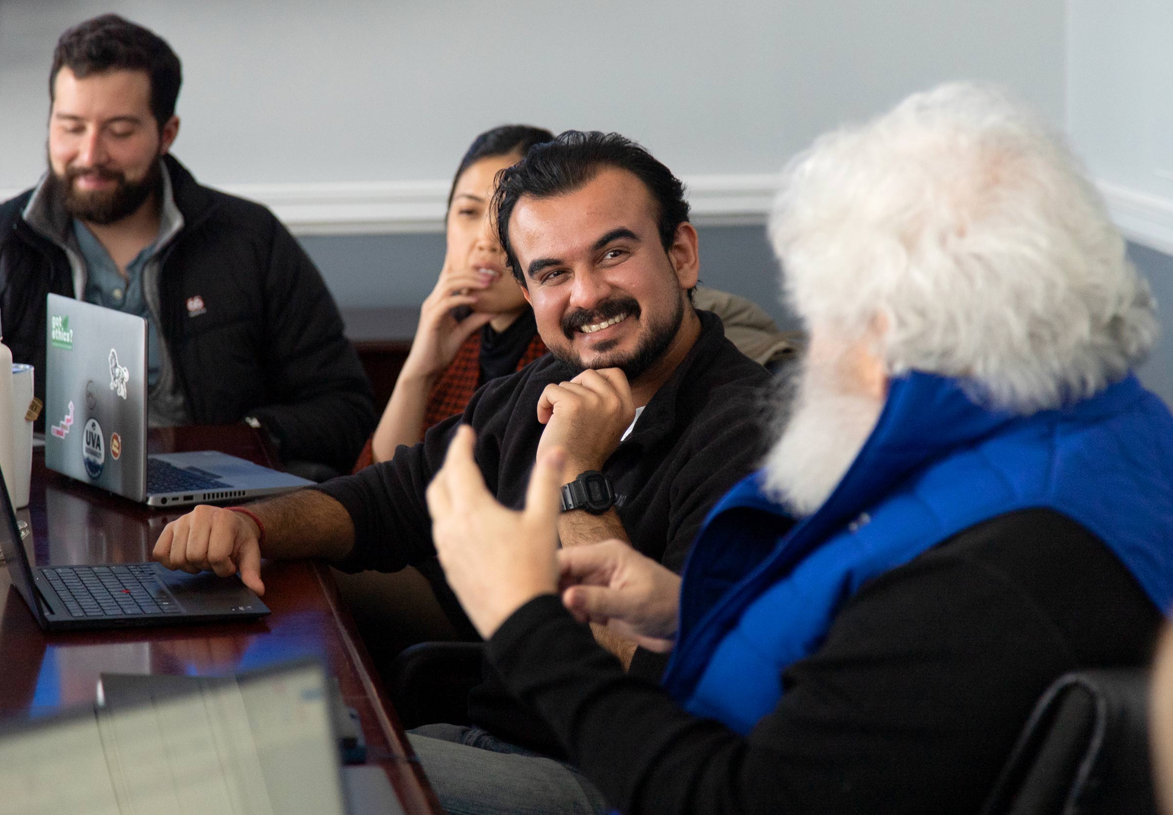 Photo of Darden PhD student Abhishek Kulkarni smiling in class.