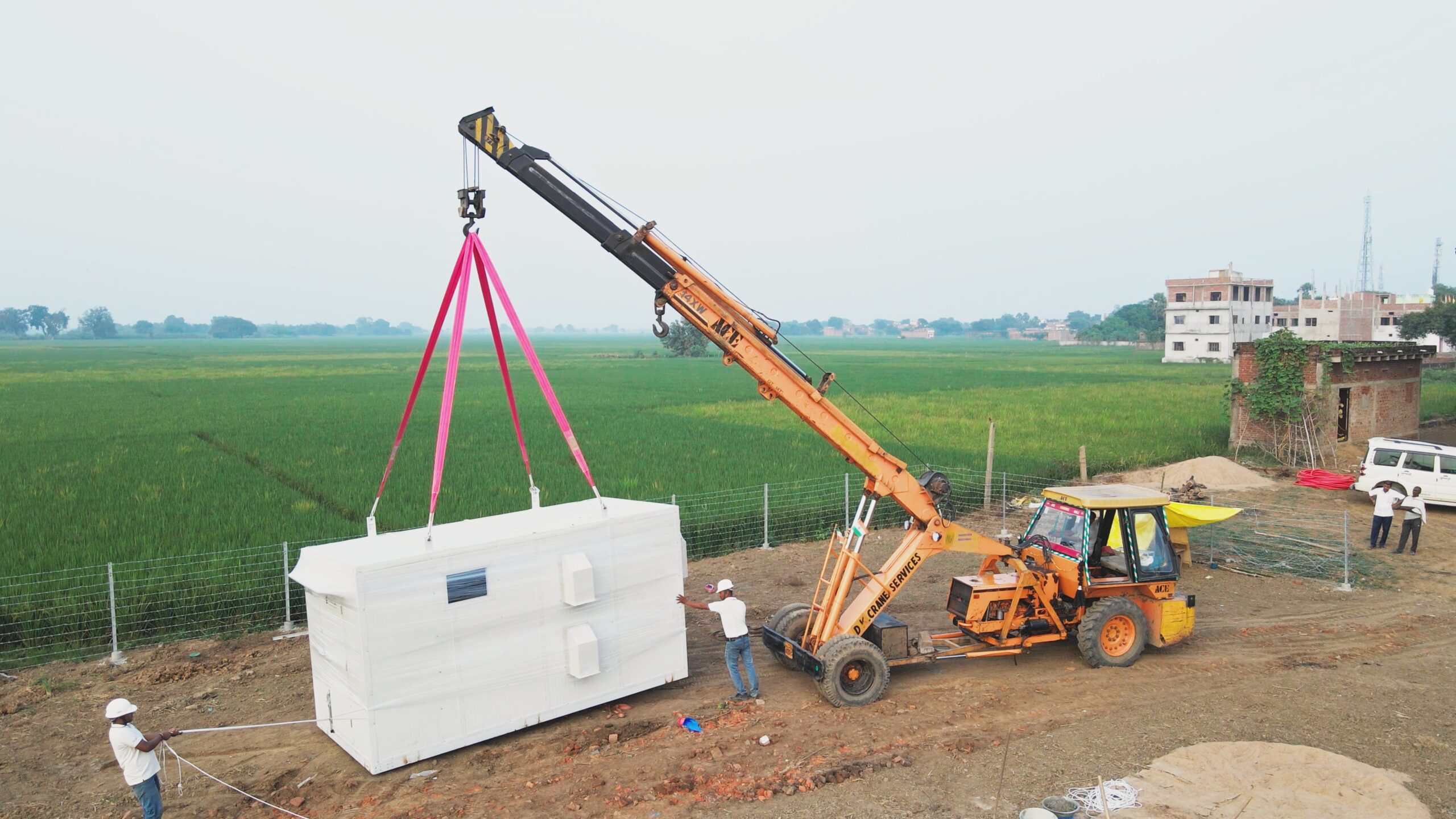 Construction on a Husk Power Systems minigrid.